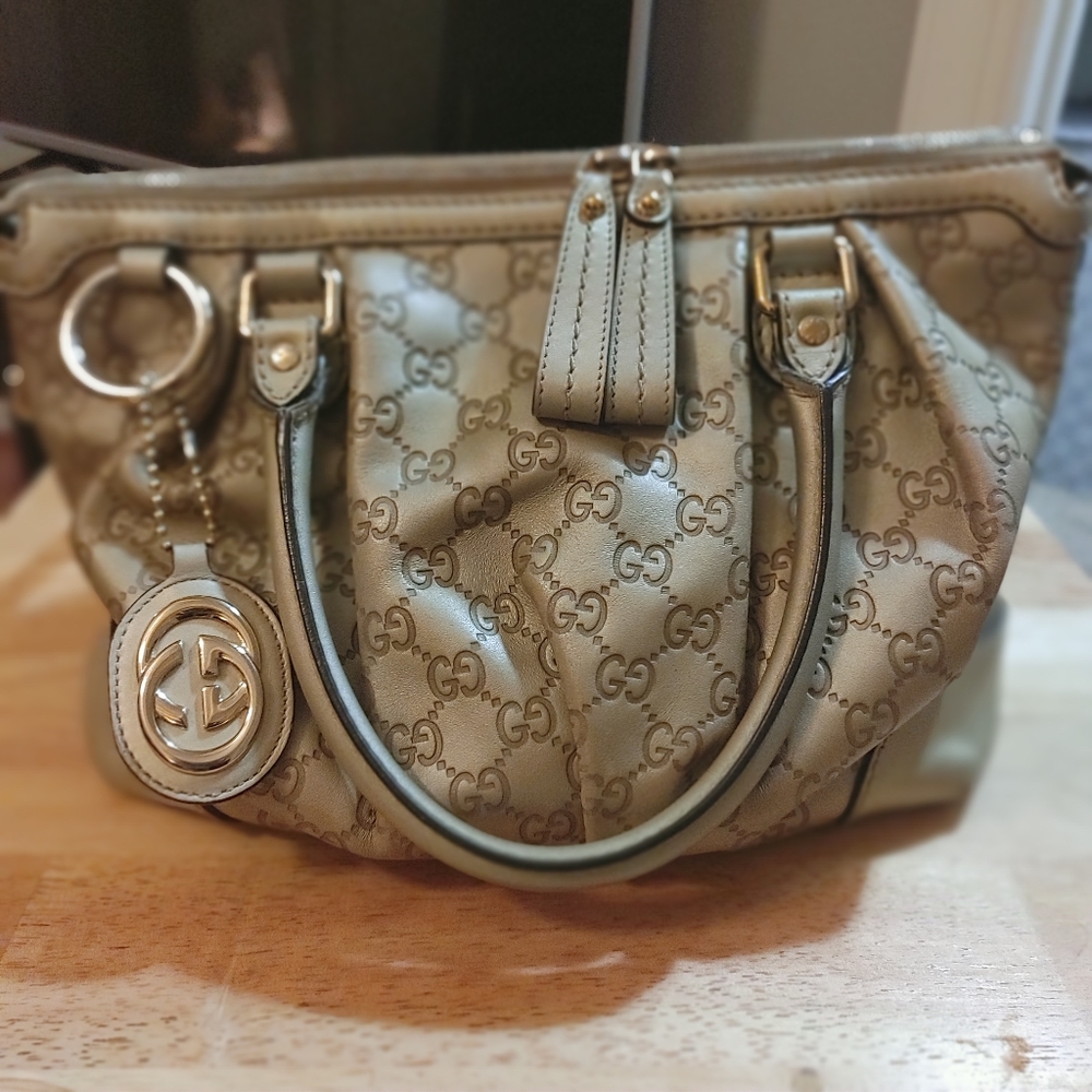 Gucci handbag with strap